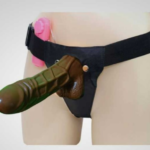 Strap on Dildo With Vibrator will help you treat yourself and your partner to a truly enjoyable sexual experience. Created to look and feel like an erect male penis, this lifelike dildo features a textured shaft that is realistically veined for the ultimate visual pleasure. The vibrating shaft of the dildo is cleverly placed at the top of the penis to stimulate and massage the clit during intercourse. You can adjust the vibrations and the penetration separately with the help of a multi-speed remote control. This is the ultimate product for couples who like to indulge in a little bondage and role-playing fun. It is also the best product for all the ladies who want a role-reversal sex scenario where they are penetrating you. Just let her strap this dildo. The hollow construction of the product allows guys to wear it as a sleeve for a deeper and more stimulating session of lovemaking. You can use this product on its own or combine it with some other bondage toys for the ultimate bondage experience. The Hollow Strap on Dildo With Vibrator will let you penetrate your lover’s body in ways you never imagined before. his sex toy is made of soft, silk-like silicone material, is completely odorless, and is body safe. It ships with an adjustable body strap-on belt that fits most people easily. Key Features Material High Quality Silicone Length × Diameter (9 × 1.9 Inch) Insertion Length 9 inches Weight 185g Color Skin Type Vibrating Hollow Dildo Brand Strap on Waterproof Life waterproof specification Vibration Speed & functions NA Shipped From Within India How To Use Start by ensuring that your strap fits your waist. It should not be loose. Do not make it too tight as well. Just wear it the way that makes you feel comfortable. Now once after it is on your body, you need to insert the dildo inside your partner’s erogenous zones. We suggest you use a compatible lubricant with your vibrating dildo to enhance your pleasure. You may indulge in vaginal as well as anal sex. Try using different positions during the act of penetration. Know how to thrust to produce great results. Keep doing as long as your partner wants you to continue. Do not forget to clean it after you are done. About The Brand Strap On Dildo is an American brand. The company specializes in the production of modern stylish and elegant, BDSM products designed specifically for couples. The collection of accessories for the bedroom consists of more than 100 items, each designed in New York. Unique products of Starp on dildo allow lovers to realize their fantasies with comfort. Among the accessories for amorous games are many “Easy to Use” products – handcuffs, foot straps, supports, and straps for binding, which will help find new poses during lovemaking or foreplay. Strap On Dildo is a brand for those who want to become even closer and learn more about their beloved partner! Strap On Dildo – a fashionable, convenient, quality guide to the world of fetish and bondage! Strap On Dildo is the perfect choice for couples who want to update their sex life.